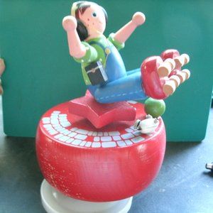 vintage wooden music box the figure goes around with the music.